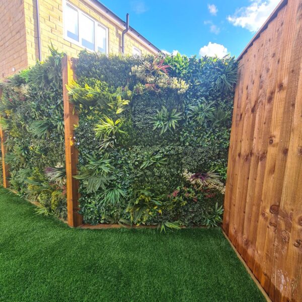 Bloom and Florian artificial living foliage panel on a fence