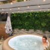 fake plant walls with hot tub