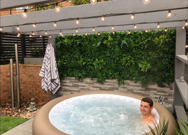 fake plant walls with hot tub