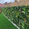 Florian + Bloom artificial living foliage panel on a fence