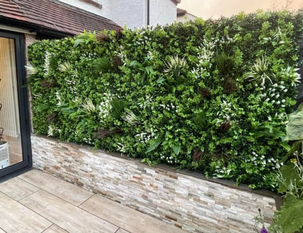 Spring White artificial wall panel on fence
