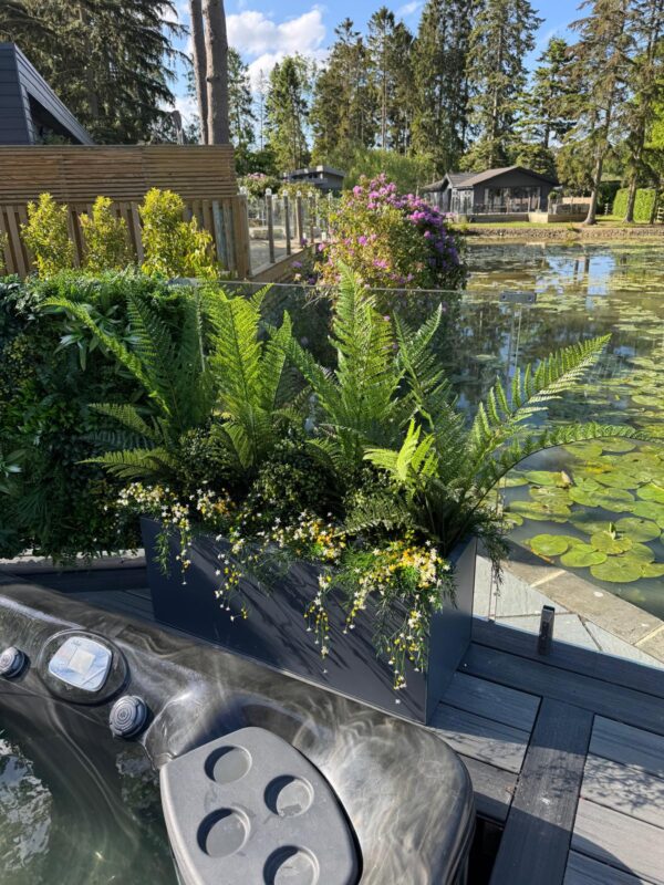 artificial plants in a planter modern